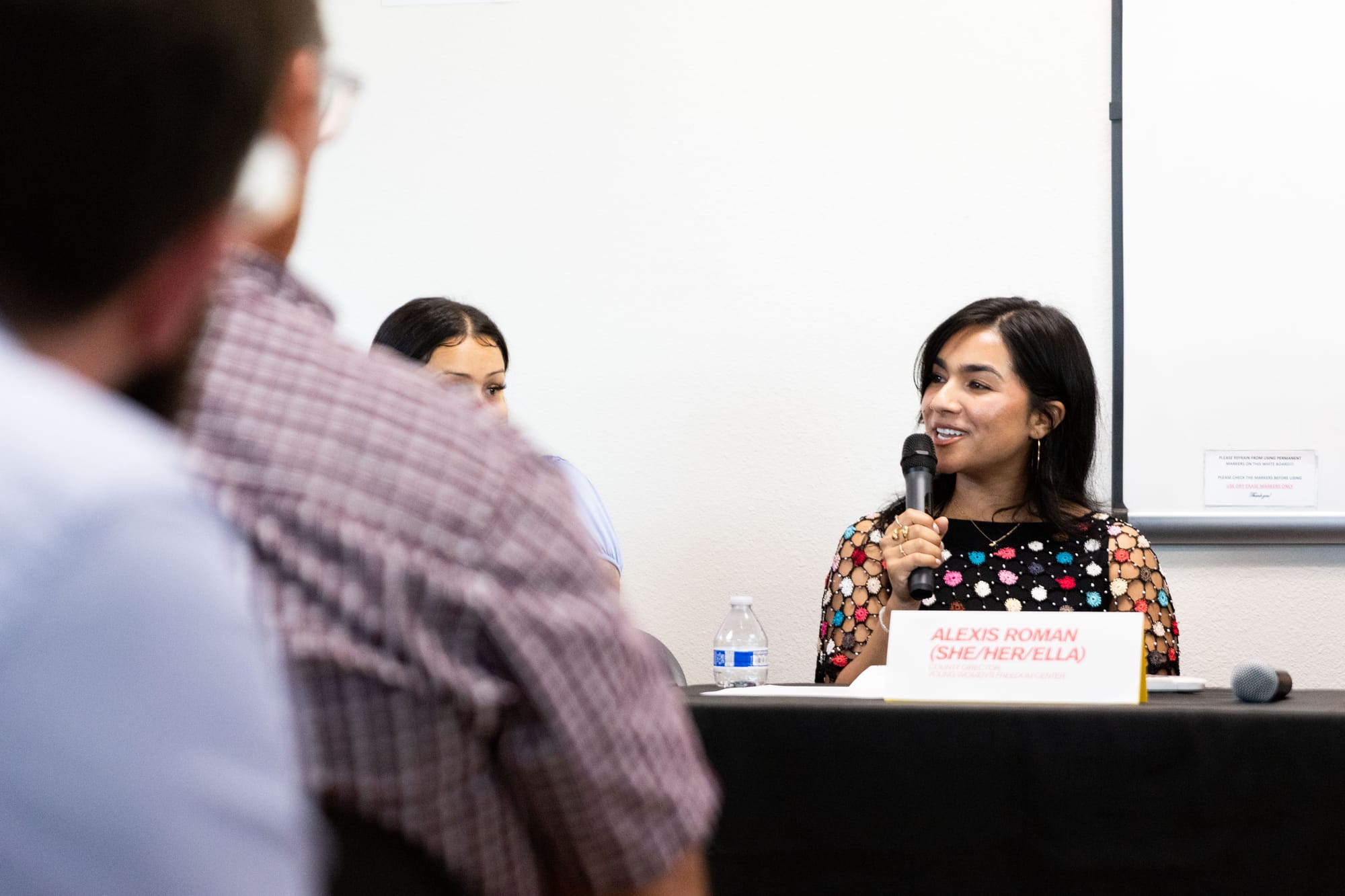 A woman speaks during an interview