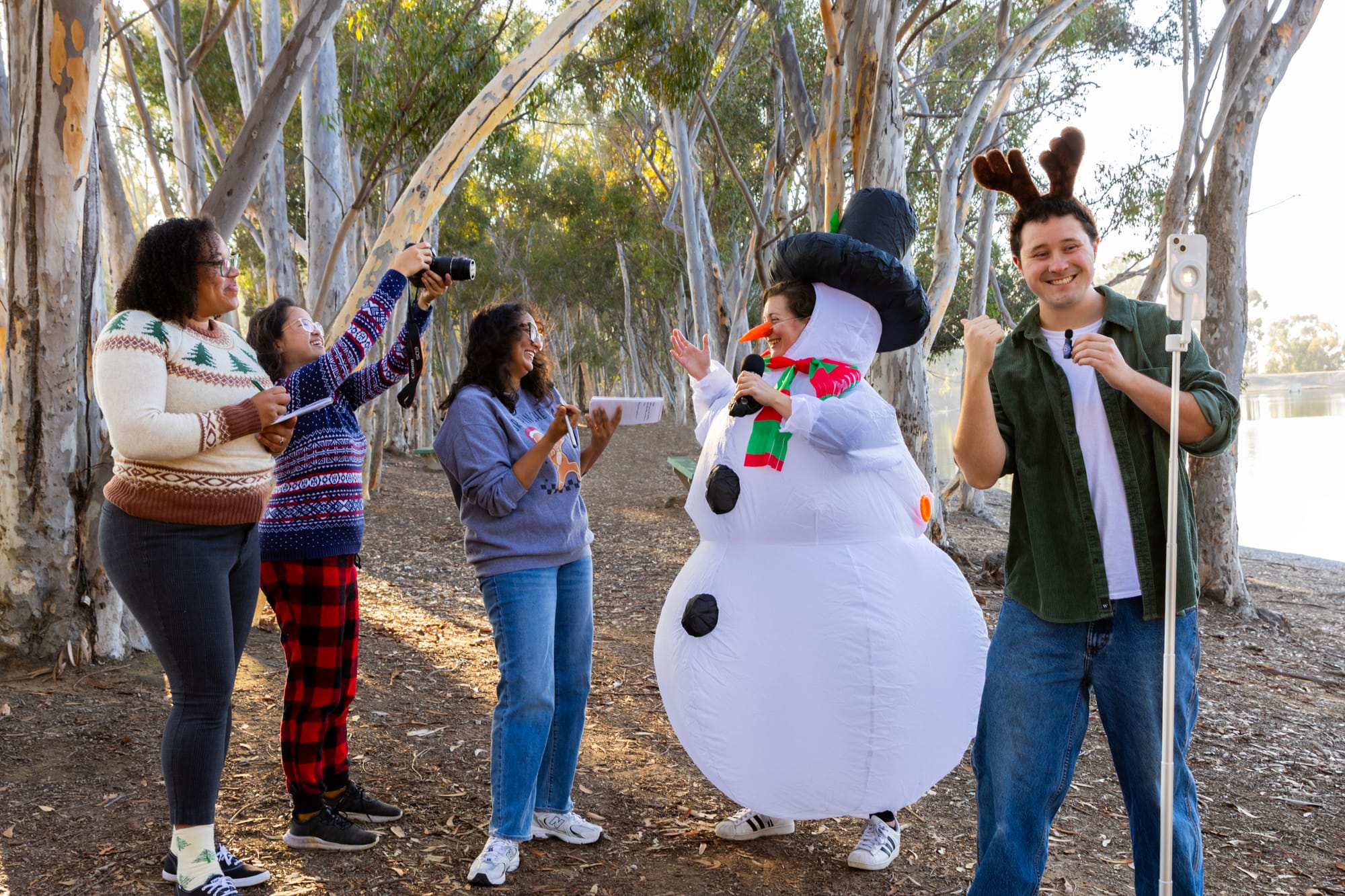 Image of five people with one in a snowperson costume