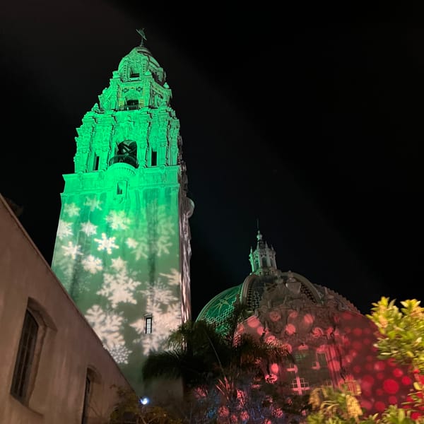 Picture of a sower and dome with holiday lights projected on them.